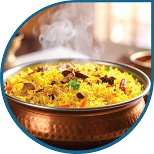 Authentic biryani dish being prepared with Olexo vegetable ghee for a rich flavor.